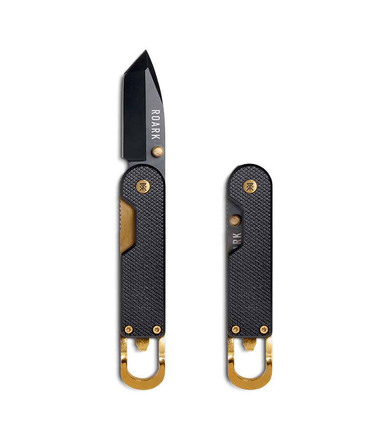 Cuchillo color negro y blanco plegable.